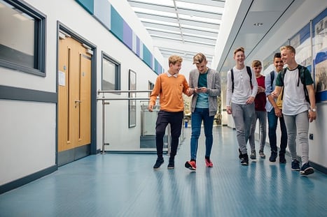 teenage boys walking in the school halls