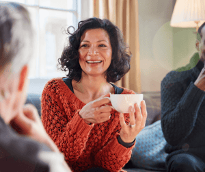 woman holding coffee cup